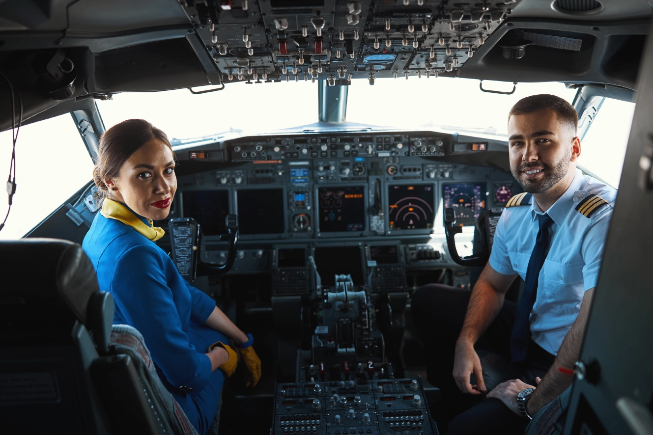 Airplane cockpit with crew members